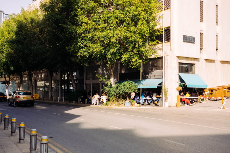 land vehicle, road, real people, transportation, coffee, city, motor vehicle, built structure, sunlight, limassol, 27mm, xe3, tree, summer, cafe, xf27mm