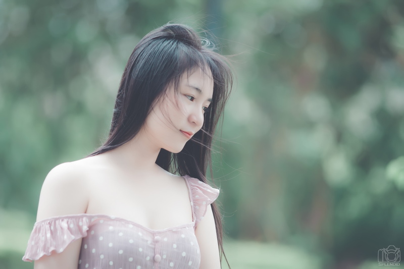 standing, long hair, smiling, teenager, front view, contemplation, looking away, bangs, one person, real people, Asian, day, young women, 4K, brunette