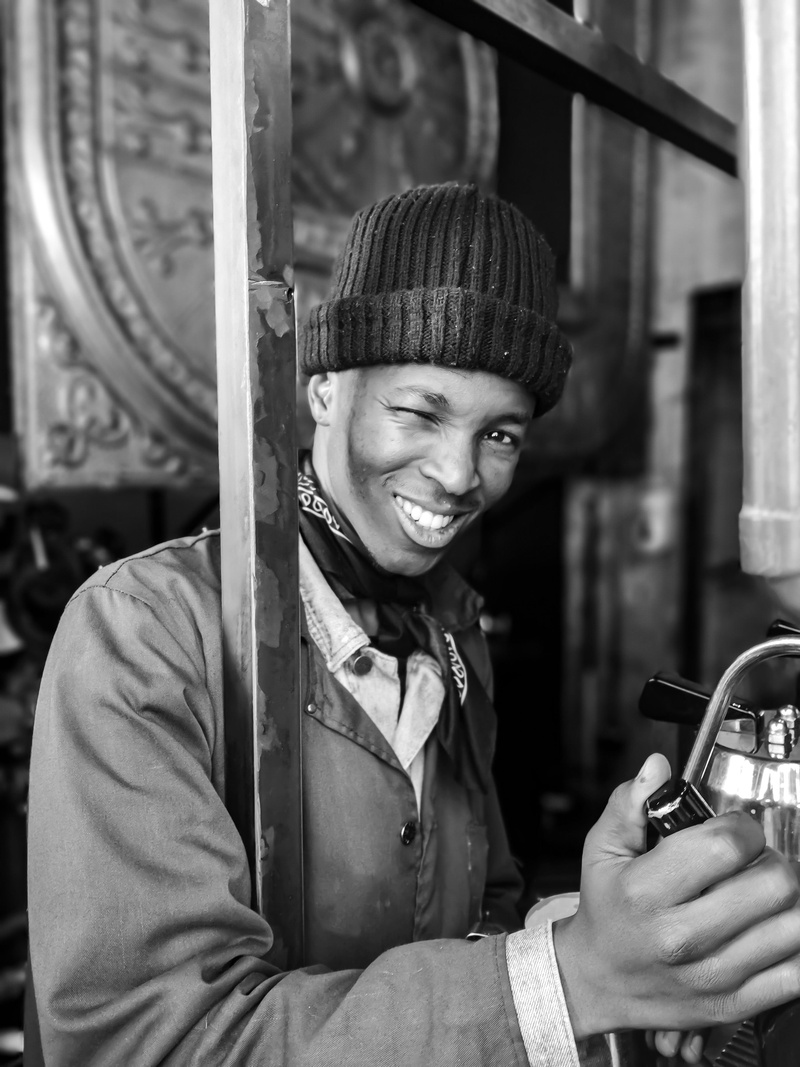 real people, pose, business, person, male, happiness, fun, wear, casual clothing, smile, adult, portrait photography, joy, one person, coffee shop, holding
