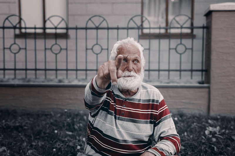 fence, loneliness, hand, mature Adult, man, mustache, aging Process, people, eyeglasses, one Man Only, eye, portrait, point, solitude, human Face, sitting