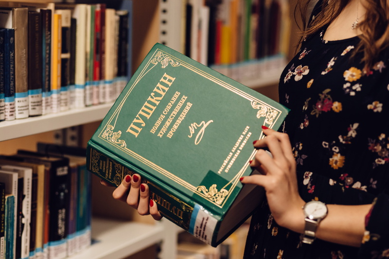 row, shelf, novel, midsection, bookshelves, human body part, learning, human hand, 5K, stock, people, adult, holding, books, bookstore, women, hand, printed dress