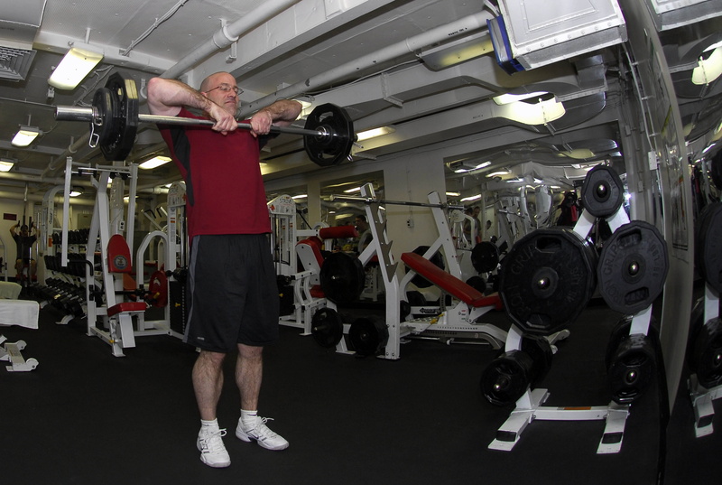 gymnastics, arms raised, standing, burn calories, indoors, sports equipment, human body part, silver, exercising, relaxation, barbell, gym room, elderly person