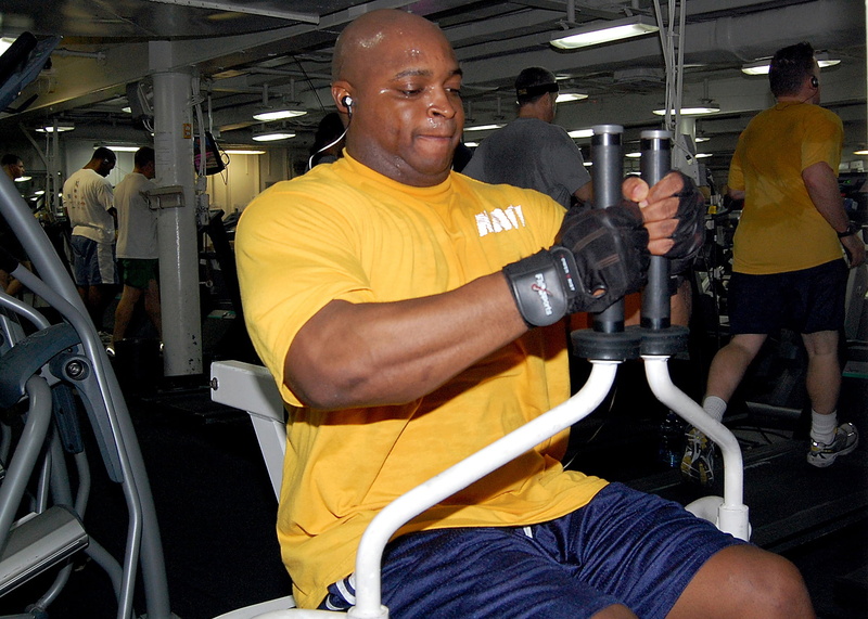 to tone up, gymnastics, lifestyles, real people, machine, indoors, exercise, olympic lifting platform, white, performance, adult, treadmill, equipment