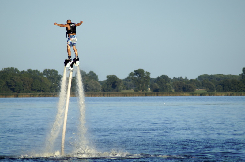 5K, plant, spraying, water jetpack, water sports, lake, motion, joy, jumping, waterfront, day, water jet, fun, nature, jetpack, clear sky, sport, stunt