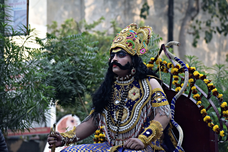 day, 5K, young adult, one person, real people, looking away, celebration, ramayana, headdress, dusshera, headwear, lifestyles, focus on foreground, outdoors