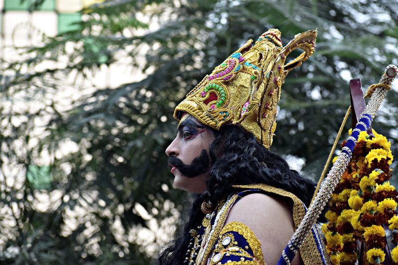 clothing, looking, side view, 5K, disguise, meghnad, traditional clothing, outdoors, ramleela, close-up, creativity, tree, costume, demon, mask - disguise