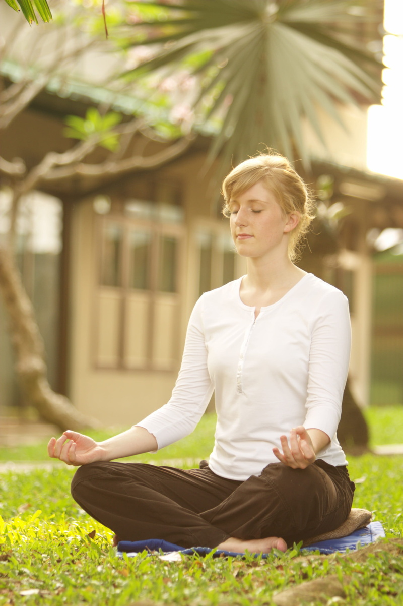 leisure activity, real people, beautiful woman, day, wat, sitting, phra dhammakaya, lotus position, buddhist, lifestyles, relaxation, buddhism, thailand