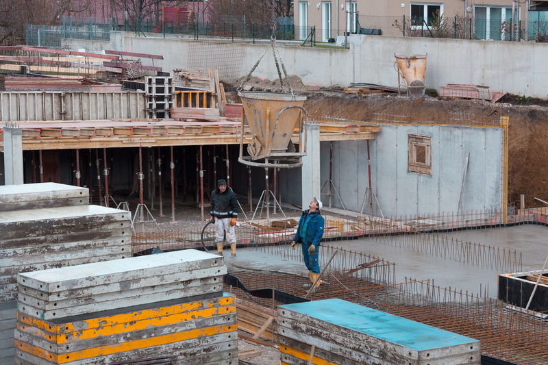 growing region, liquid, occupation, men, working, bottom plate, team, one person, building exterior, real people, effort, formwork, construction site, built structure