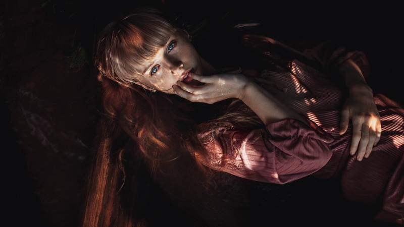 young women, finger on lips, dark, black background, studio shot, hairstyle, portrait, contemplation, dress, hair, blue eyes, digital composite, indoors