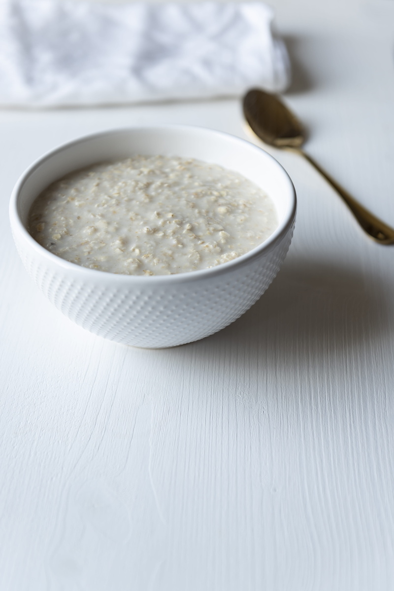 white bowl, ceramic, minimal, indoors, organic, high angle view, healthy eating, light, wood - material, still life, sugar, porridge, cooking, food, close-up