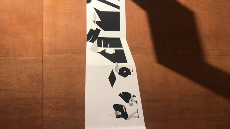 wall - building feature, communication, no people, leisure games, wall, number, paper, trademark, symbol, high angle view, logo, day, sunlight, leisure activity