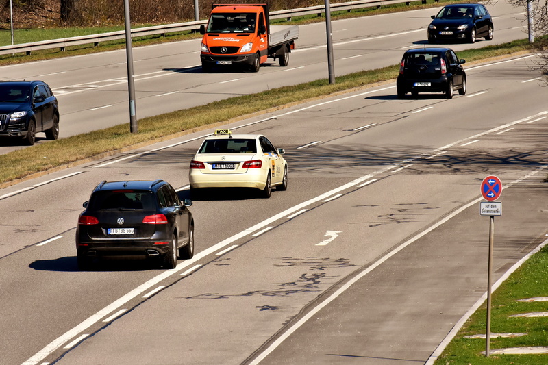 travel, outdoors, street, multiple lane highway, road marking, incidental people, land vehicle, day, transportation, city, auto, road trip, motor vehicle