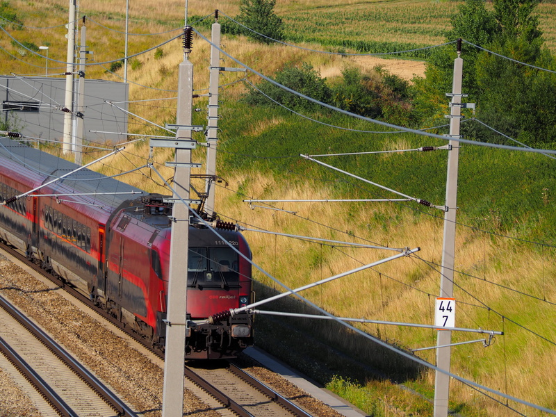 traffic, plant, steam train, public transportation, outdoors, electricity, land vehicle, nature, locomotive, transport, motion, day, railroad track, train - vehicle