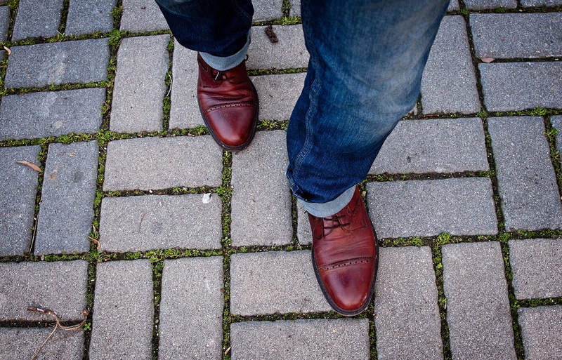 blue, street, standing, human limb, footpath, high angle view, paved, leather, shoe, walking, clothing, walkind, jeans, pathway, 2K, pavement, paving stone