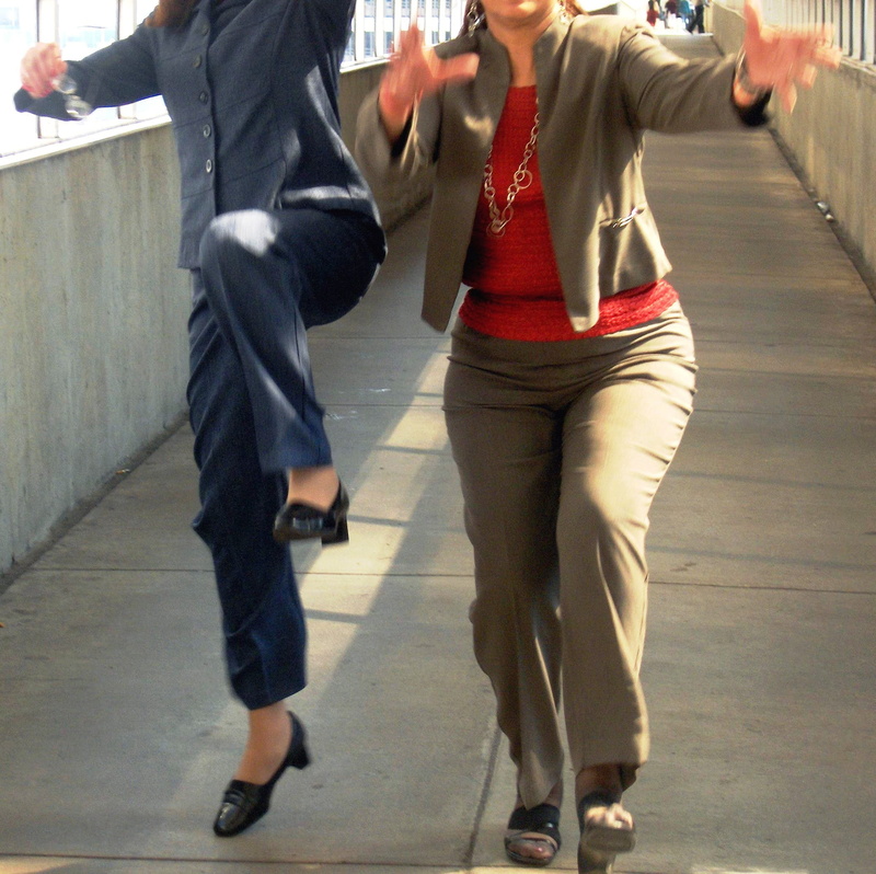 motion, successful, pants, fun, moving, dom, happy, casual clothing, jumping, sidewalk, day, real people, jump, positive emotion, red, brown, victory, low section