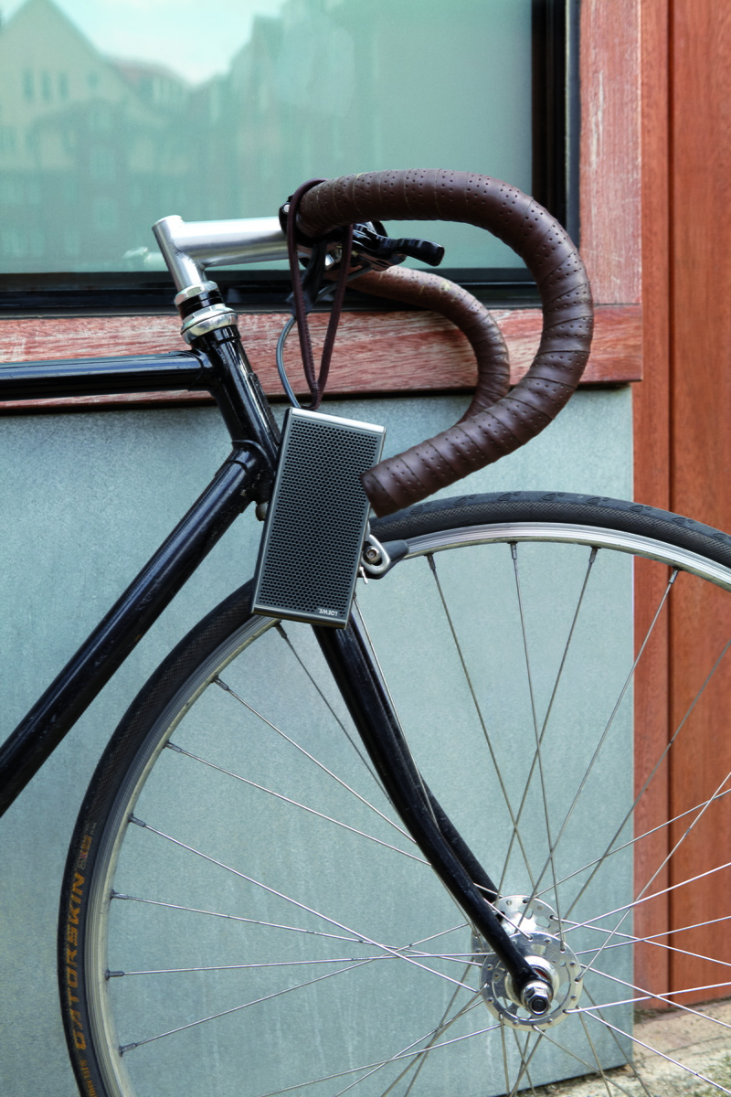 road, mode of transportation, gray, close-up, leaning, stationary, transportation, bike, land vehicle, brown, wall, spoke, concrete, lock, wall - building feature