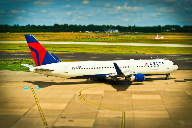 day, traffic, airplane, outdoors, travel plane, sky, Travel, plane, transport, focus on foreground, nature, passenger aircraft, text, locomotion, Departure