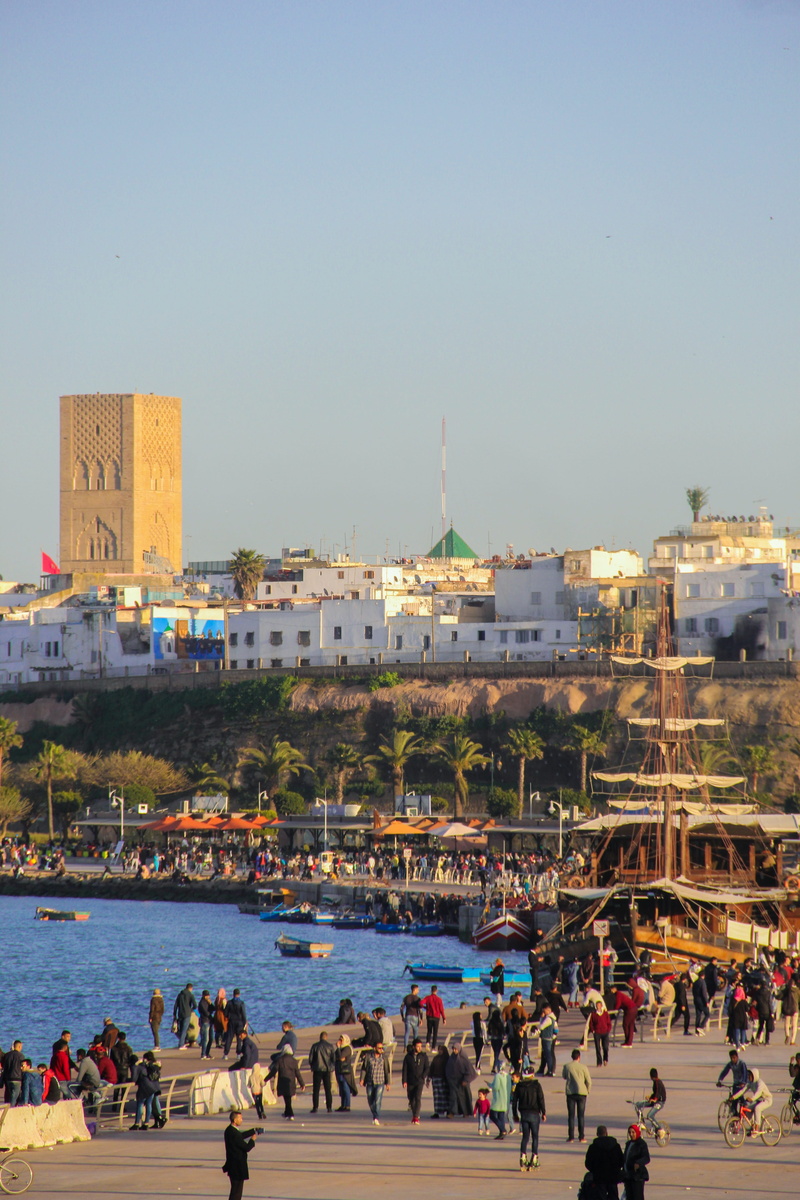city, lifestyles, tower, travel destinations, travel, mosque, outdoors, group of people, built structure, rabat, 5K, beach, architecture, day, water, crowd