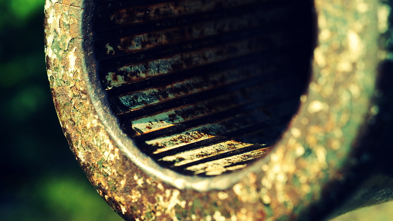 cannons, tube, pattern, weathered, day, rusty, decline, old, abandoned, focus on foreground, colored, close-up, geometric shape, tire, filter, text, deterioration