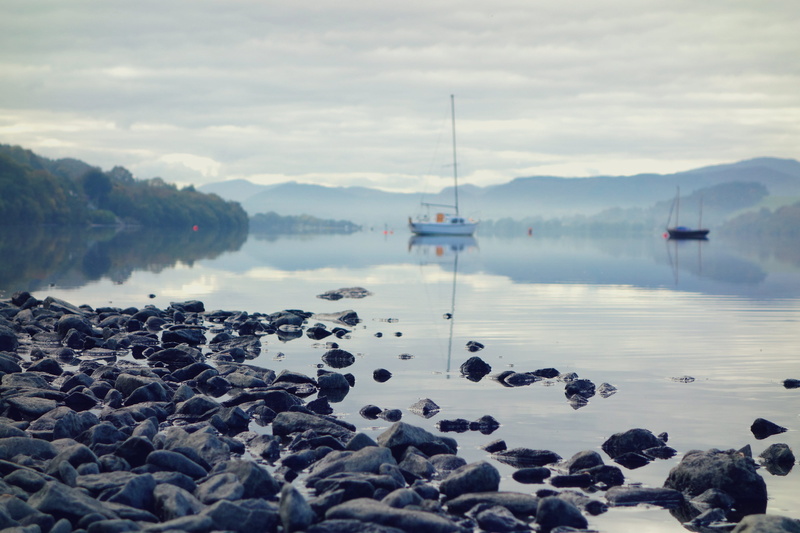bala, no people, cloud - sky, idyllic, rock - object, boat, tranquility, non-urban scene, pebble, reflection, outdoors, solid, sea, rock, sailboat, llyn tegid
