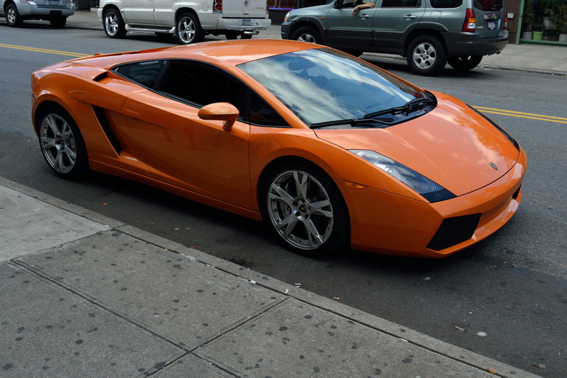 sidewalk, architecture, outdoors, hot car, retro styled, technology, lamborghini, orange car, modern, luxury coupe, vehicle, motor vehicle, road, 4K, day