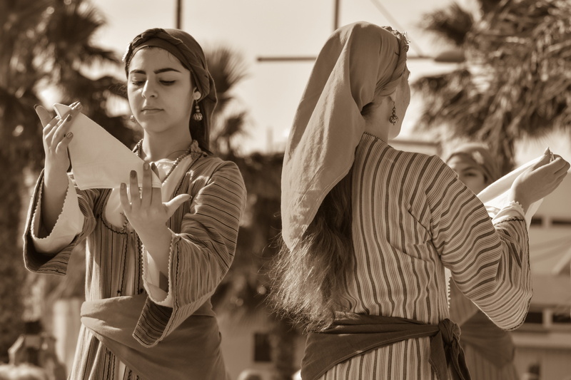 ethnicity, holding, folklore, front view, lifestyles, dress, waist up, uniform, communication, technology, portrait, young, focus on foreground, folk, casual clothing