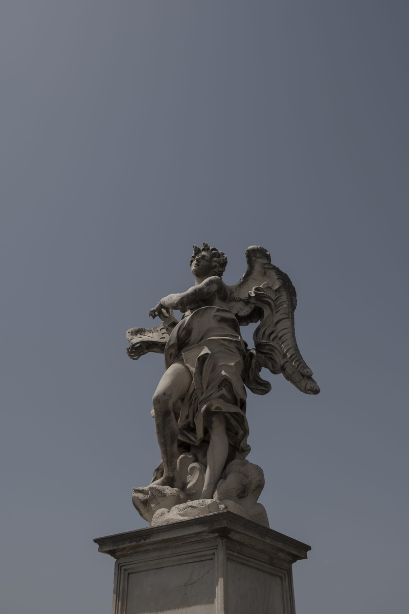 p.za pia/castel s. angelo, nature, animal wing, sunlight, female likeness, dramatic, male likeness, craft, sky, art and craft, statue, old, clear sky, creativity