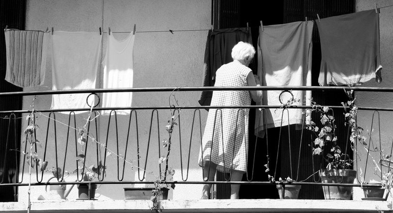 washing, terrace, laundry, men, beside, female, outside, one person, railing, leisure activity, building exterior, day, one, housewife, old woman, pot