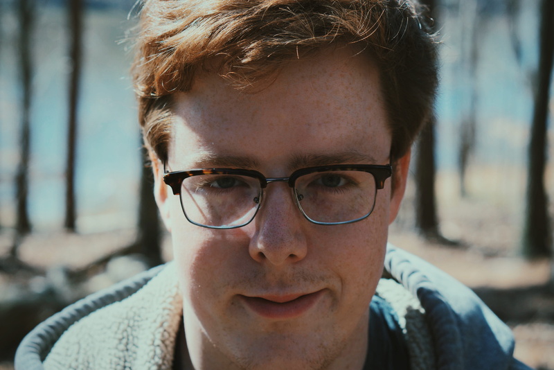 body part, face, young adult, teenage boys, outdoors, close-up, sunglasses, frame, headshot, adult, jacket, eyeglasses, one Man Only, man, blue, selfie