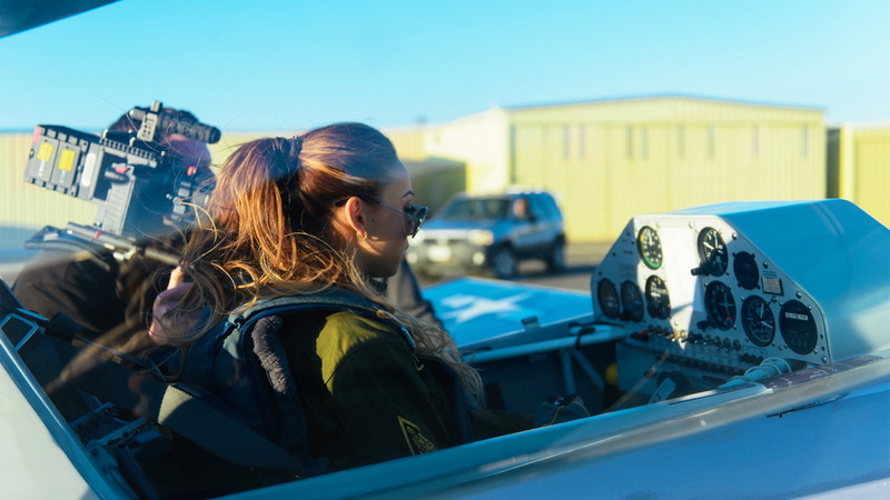 outdoors, young adult, one person, women with shades, women, focus on foreground, women with planes, airplane, side view, clothing, young women, sitting
