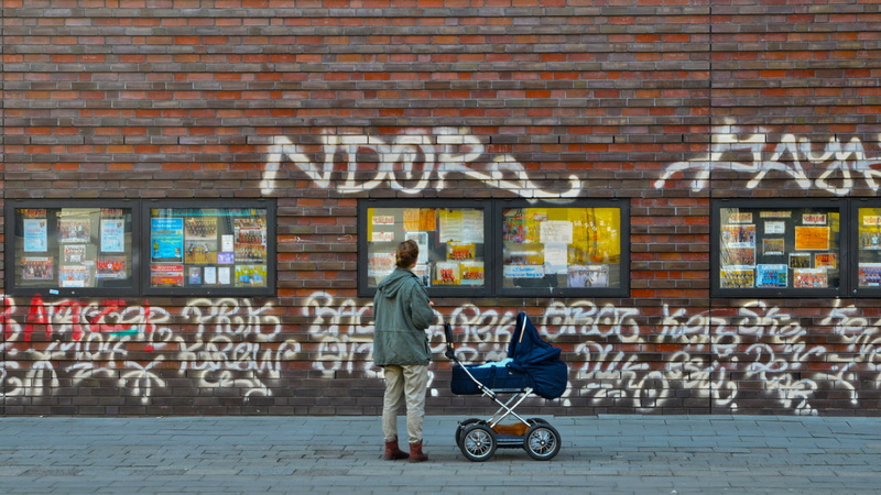 architecture, kid, riding, brick, outdoors, city, walking, full length, casual, built structure, young, woman, transportation, baby, wall, emotions, brick wall