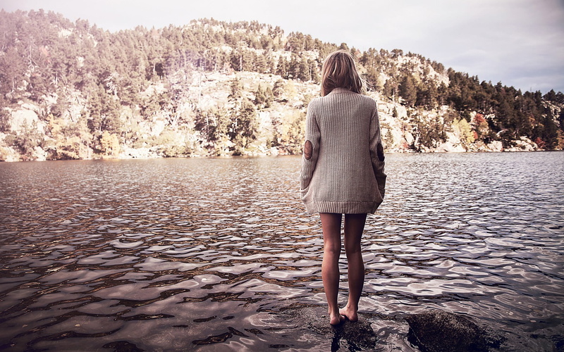 beauty in nature, back, adult, women outdoors, leisure activity, young women, lake, blonde, water, outdoors, standing, one person, hills, warm clothing