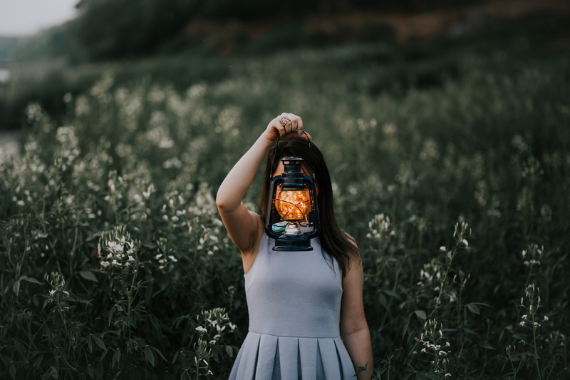 white, garden, photography, dress, beauty in nature, outdoors, lamp, fairy lights, land, young adult, front view, dark, 4K, field, focus, hand, plant