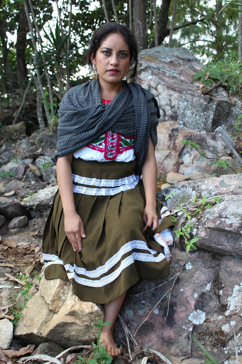 mexican, full length, chatino, indian, looking at camera, traditional clothes, nature, contemplation, solid, outdoors, young adult, hairstyle, day, beautiful woman
