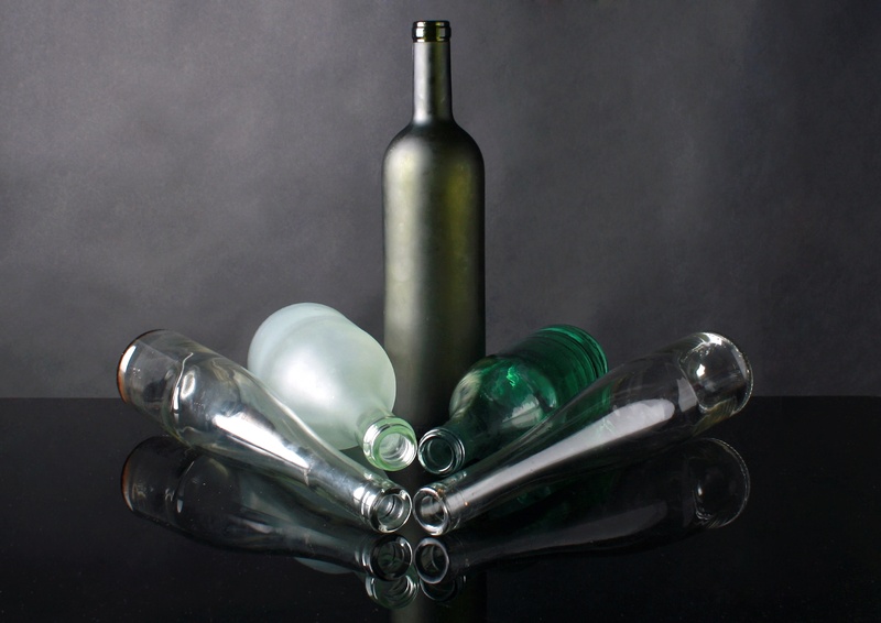photo, studio shot, white, bottle, green, container, green color, glass, transparent, no people, food and drink, several, alcohol, group of objects, black