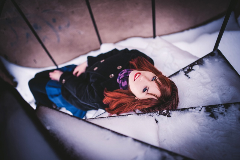 beautiful people, high angle view, portrait, fashion, adult, young adult, 2K, lying down, flooring, one person, indoors, hairstyle, women readhead blue eyes snow stairs