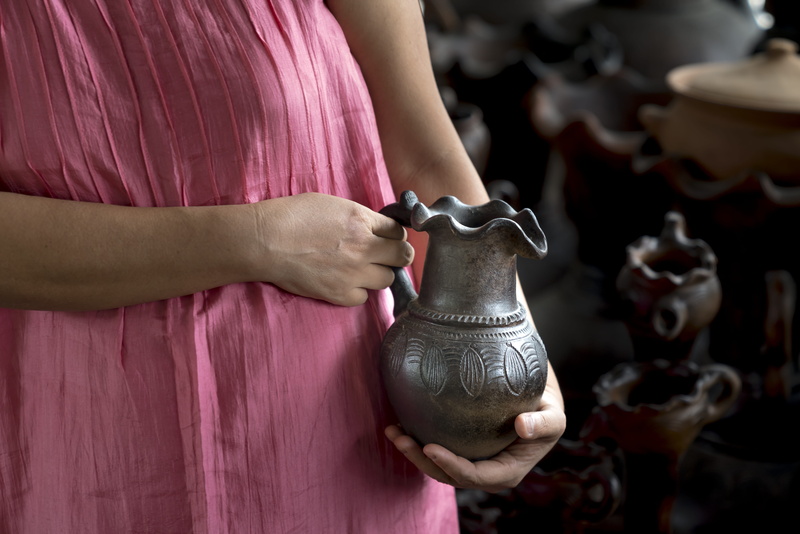 throw, purple, hand, clay, craftsperson, one person, production, indoors, production object, mud, market, skill, circle, potted plants, south east asia