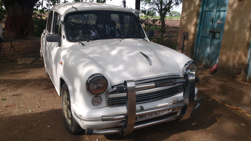 transportation, 4K, ambassador car very rare model, stationary, car, mode of transportation, front view, headlight, abandoned, run-down, deterioration