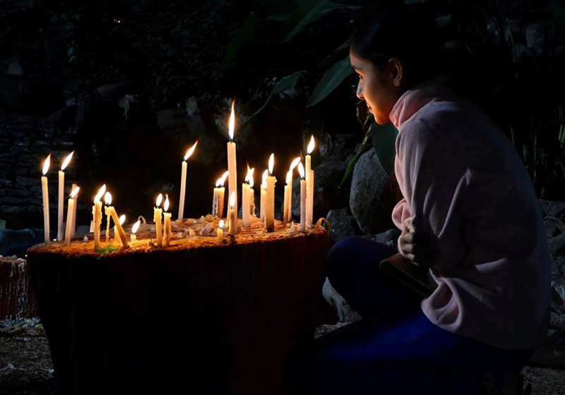 praying, flame, healing, birthday candles, cake, fire - Natural Phenomenon, body massage, night, foot reflexology, one person, dark, body part, Prayer