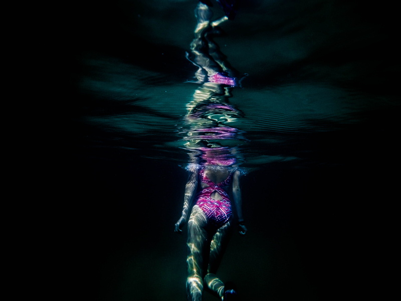darkness, water, peaceful, swimsuit, bathing suit, bathsuit, exploration, dark, purple, strength, onepiece, leg, marine, one person, outdoors, sport, pink