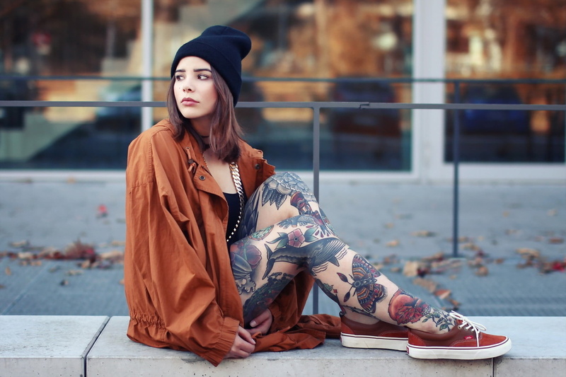 1080P, focus on foreground, tattoo, beautiful woman, young adult, scarf, women, sitting, portrait, lifestyles, sneakers, hairstyle, leisure activity, casual clothing