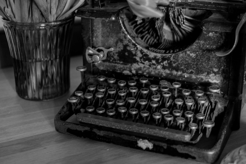 typewriter, obsolete, retro styled, table, technology, indoors, balck and white, vintage, antique, no people, nostalgia, close-up, communication, wood - material