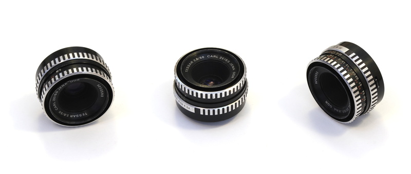 carl zeiss, lens, studio shot, looking at view, black color, 5K, no people, digital, group, white color, photo, security, isolated, single Object, photography Themes