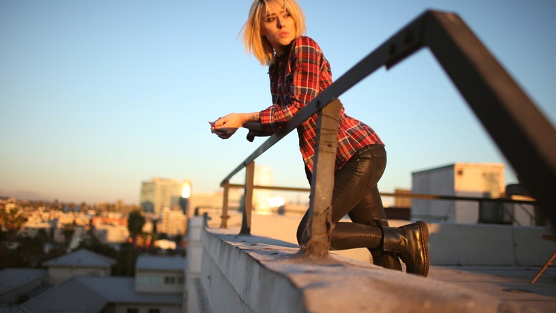 architecture, sky, building exterior, women, young adult, sunlight, casual clothing, blonde, full length, 1080P, day, copy space, one person, boots, beautiful woman