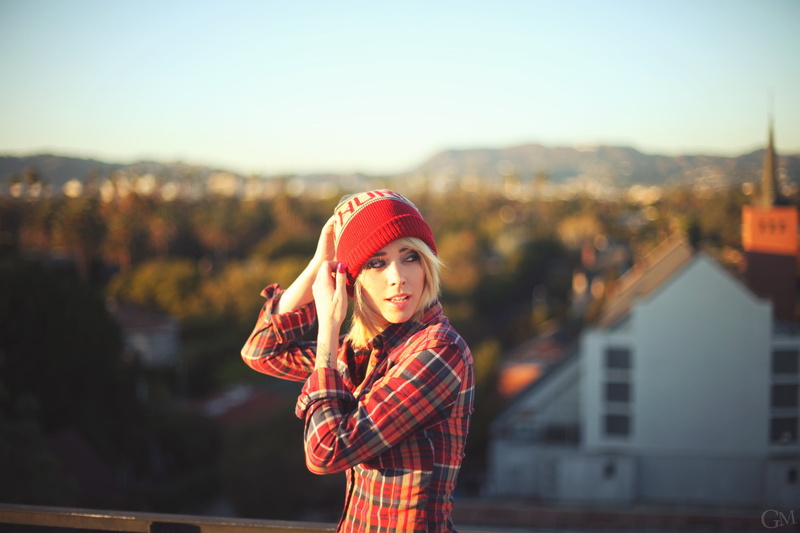 open mouth, leisure activity, 1080P, standing, plaid shirt, beautiful woman, young women, warm clothing, smiling, checked pattern, outdoors, hat, focus on foreground