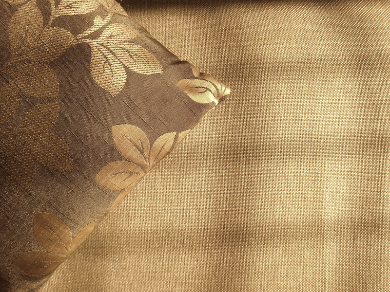 pillow, human body part, material, color, textile, full frame, softness, brown, backgrounds, fabric, clothing, textured, high angle view, sunlight, surface