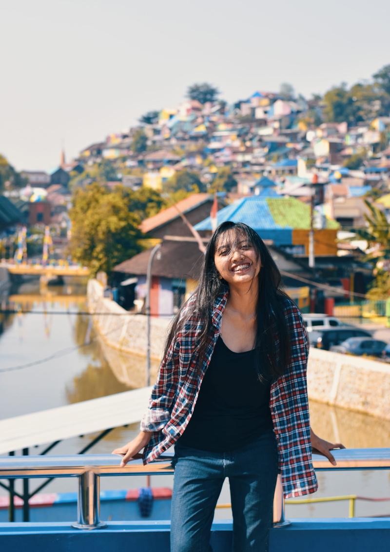 stainless, 2K, girl, day, outdoor, casual clothing, smile, river, real people, built structure, leaning, three quarter length, emotion, one person, young adult
