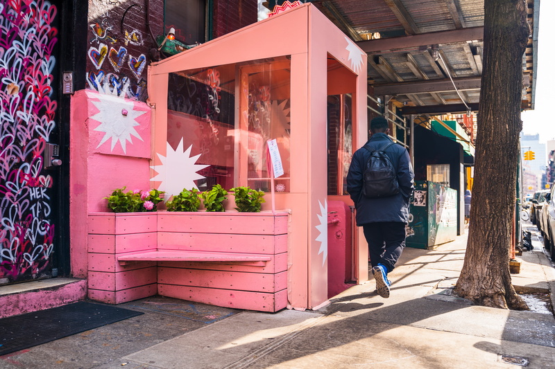overcoat, man, shop, one person, beside, day, person, architecture, footwear, 5K, vase, pottery, urban, nature, casual clothing, shadow, coat, sidewalk
