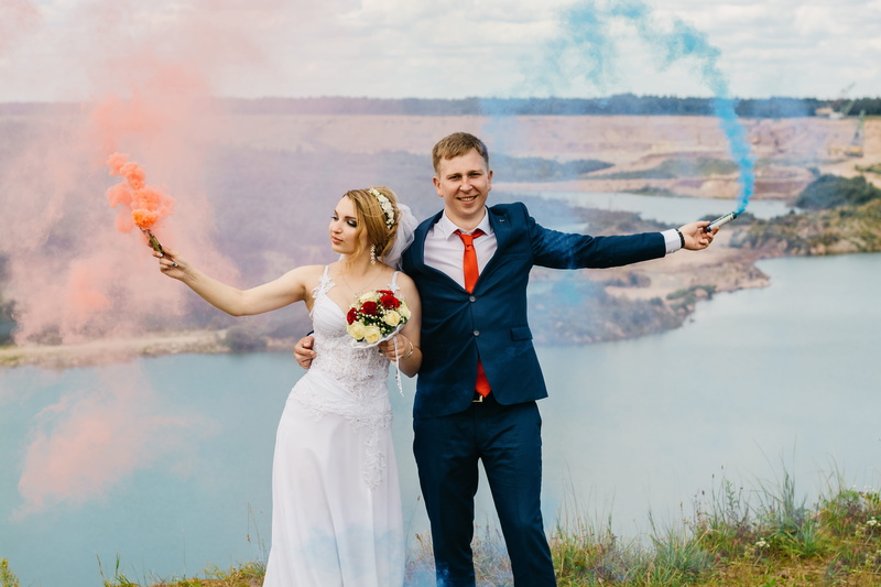 couple - relationship, smoke, flowers, girl, beautiful, bride, wedding, man, people, emotion, front view, portrait, marriage, togetherness, happiness, bonding