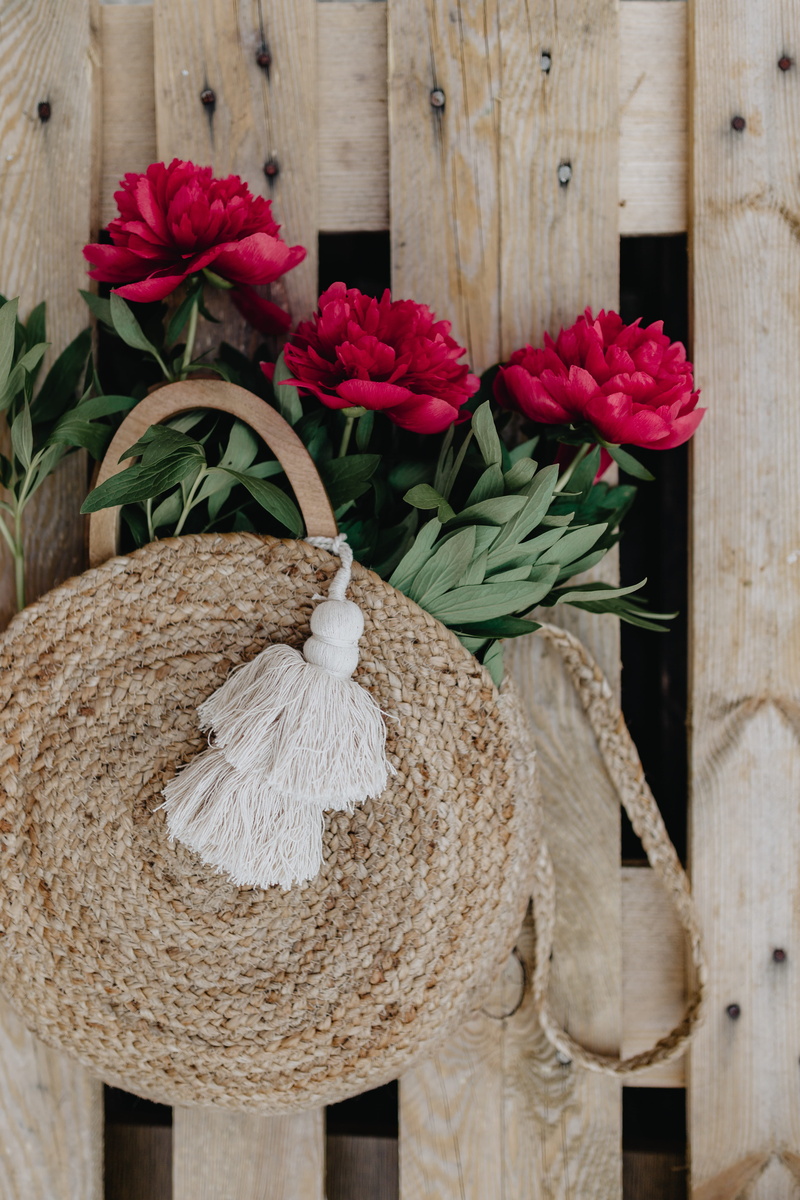 outdoors, beauty in nature, zara bag, freshness, boundary, wood - material, nature, peonies, hanging, decoration, flowering plant, fence, plant, plant part